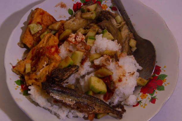 istock rice with a side dish of chili tofu and Indonesian shrimp paste fish from East Java 1913956651