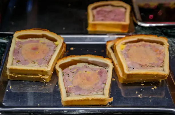 Photo of Head cheese pate in a pastry, fromage de tete at a bakery in Strasbourg, France