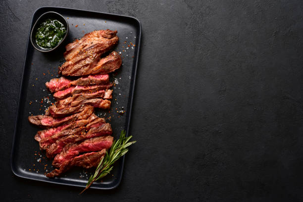 istock Grilled marbled beef steak. Top view with copy space. 1913976208