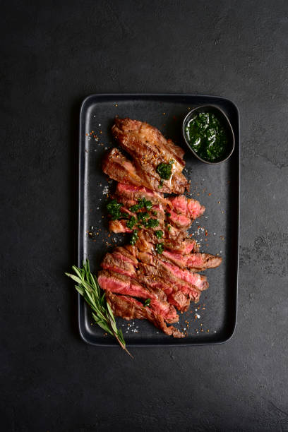 istock Grilled marbled beef steak. Top view with copy space. 1913976712