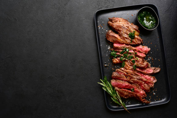 istock Grilled marbled beef steak. Top view with copy space. 1913978239