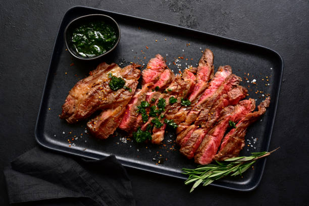 istock Grilled marbled beef steak. Top view with copy space. 1913979788