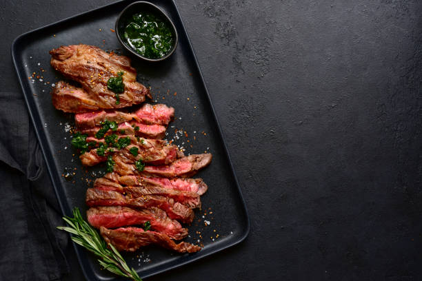 istock Grilled marbled beef steak. Top view with copy space. 1913979789