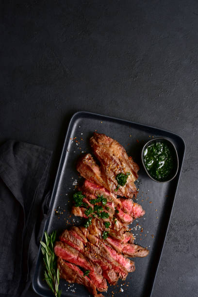 istock Grilled marbled beef steak. Top view with copy space. 1913981336