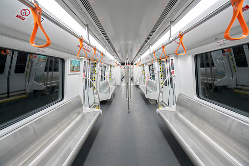The empty interior of the subway car