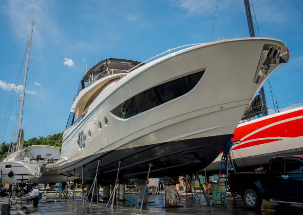 istock Motor yacht moored for repairs and service in dry dock 1914045839