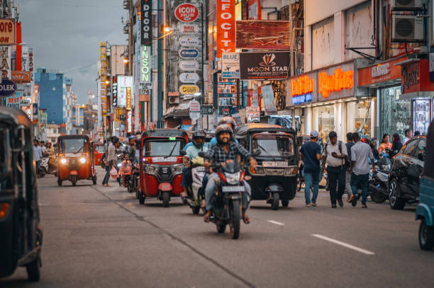 Crowds and businesses on the streets of Colombo, Sri Lanka. Colombo, Sri Lanka -November 21, 2023:
A busy scene in the streets of Colombo, popular with both tourists and locals and lined with shops, bars, restaurants. sri lanka business stock pictures, royalty-free photos & images