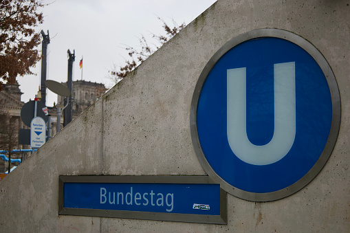 Berlin, Germany, January 04, 2024, Bundestag Underground Station sign with a Palestine Sticker on it.