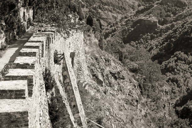 istock Old castle wall remains in a mountain range 1914136805