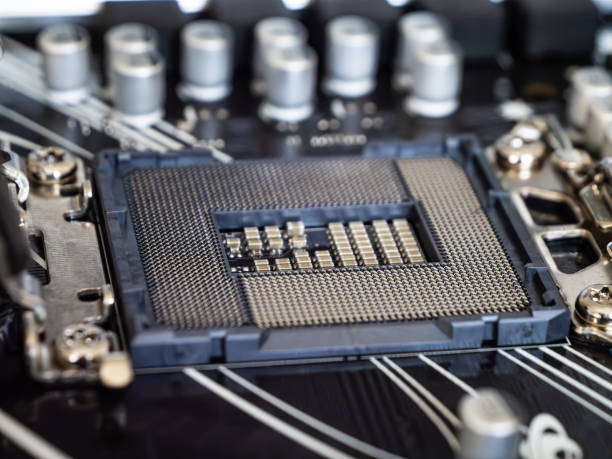 istock Closeup view of a CPU socket on a black motherboard 1914137658