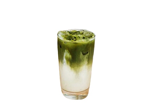 The white background in the picture is fresh milk green tea in a clear glass. You can see fresh milk at the bottom of the glass and colored green tea on top floating with ice.