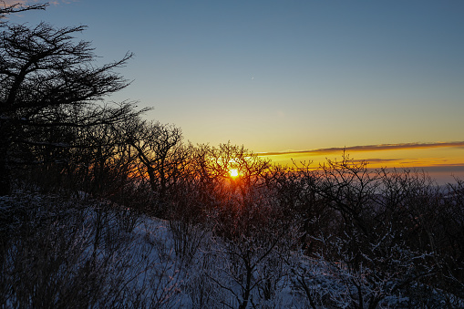 quiet sunset over a winter plains