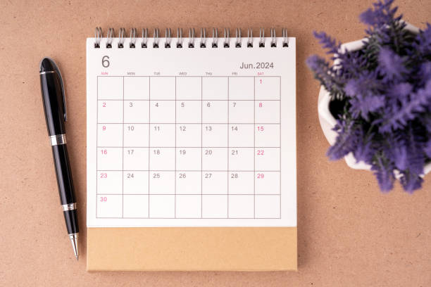 istock June 2024 desk calendar flat lay 1914156211