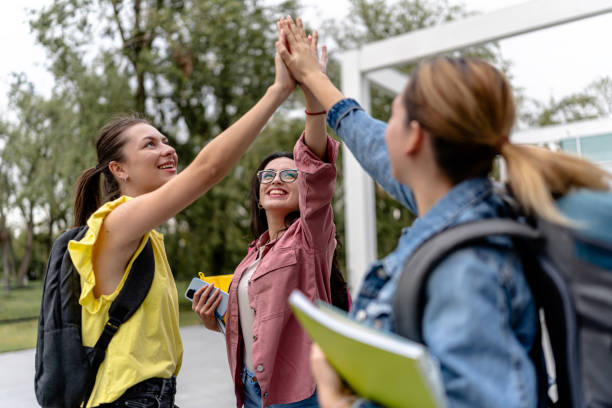 istock High fives mark student meetup 1914169700