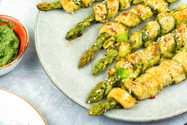 istock Asparagus baked in puff pastry. 1914213149