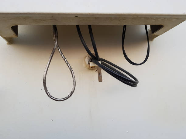 istock Telephone cables hanging from the attachment box 1914217812