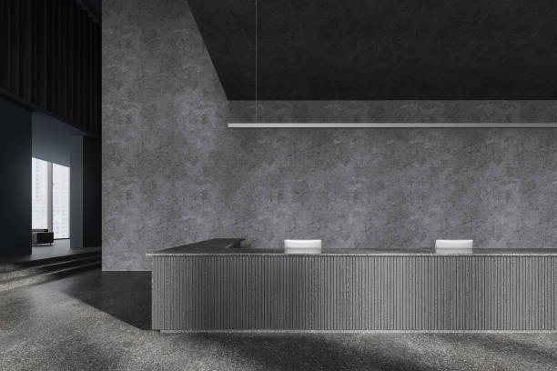 istock Grey business reception interior desk and waiting area, panoramic window 1914222067