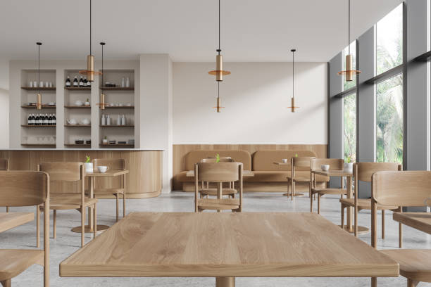 istock Beige restaurant interior with seats and table, bar counter and panoramic window 1914226183