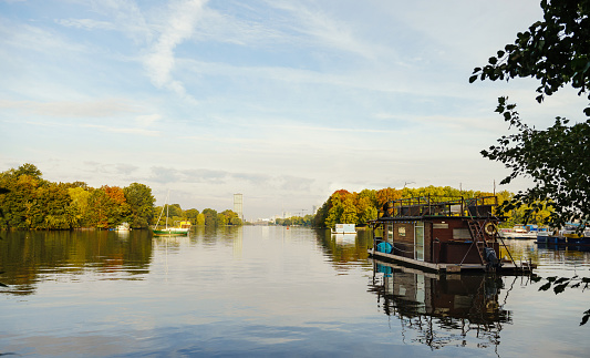 Boats and houseboat anchoring on rummelsburg lake in Berlin, Germany