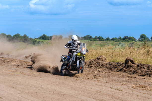 istock Motocross rider riding on extreme dust track 1914252605