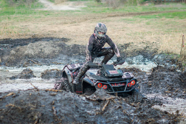 istock ATV, UTV, buggy, 4x4 off-road vehicle in muddy water. Extreme, adrenalin 1914253151