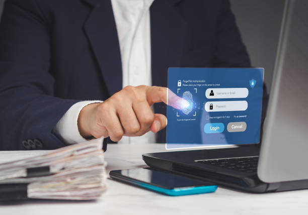 istock Log in to the system with a fingerprint on the virtual screen from a laptop 1914257904