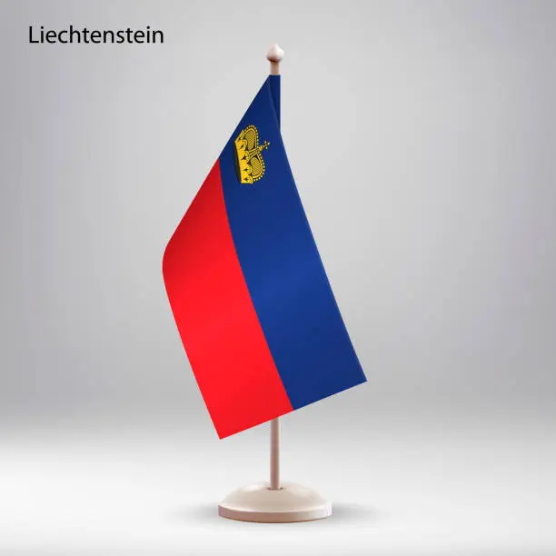 Vector illustration of Flag of Liechtenstein hanging on a flag stand.