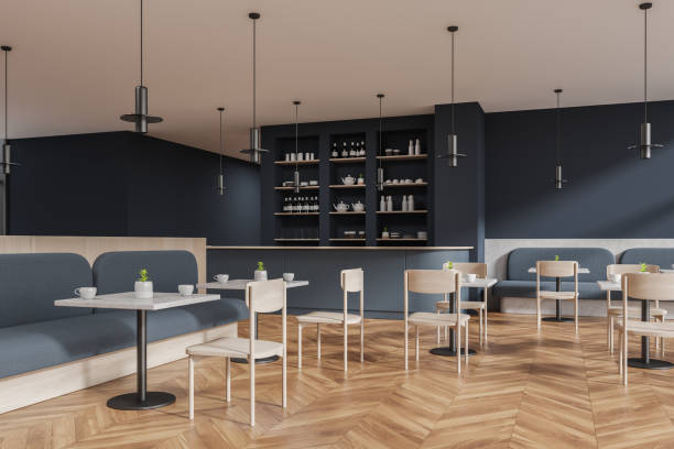 istock Dark blue cafe interior with chairs and table, eating space with bar counter 1914287784
