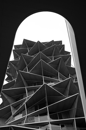 Abstract contemporary architecture. Kaktus Towers, -high rise luxury rental apartments in cactusshaped buildings with asymetric balconys filmed in black and white in Copenhagen, Denmark.