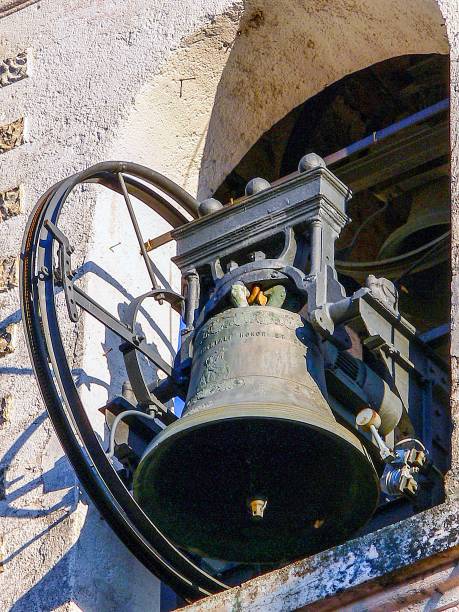 istock Old Italian church bell with a device for ringing. 1914312888