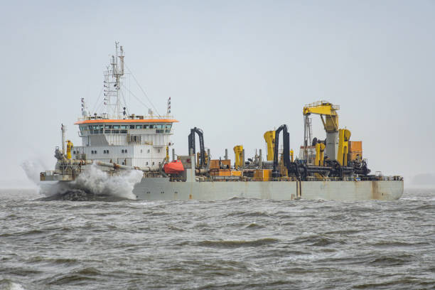 istock trailing suction hopper dredger in rough seas 1914357272