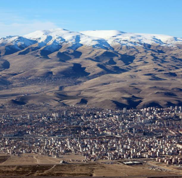 istock Stratovolcano and city 1914385734