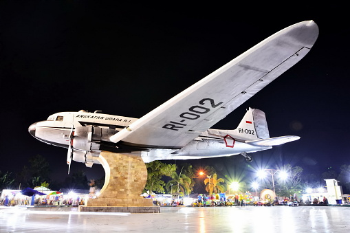 Pangkalan Bun City, Central Kalimantan Province, Indonesia - July  22, 2023 - The fuselage of the C-47 Dakota RI-002 which is no longer in use has been made into a historical monument in the center of Pangkalan Bun City. This monument called 