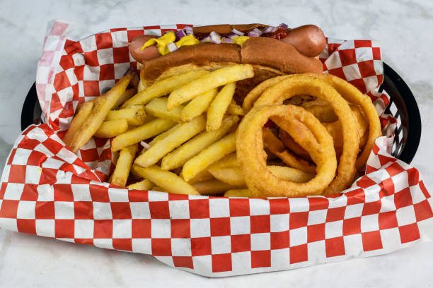istock hot dog top wwith mustard ,ketchup and onions 1914424097