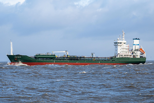 Cuxhaven, Germany - December 22, 2023: oil/ chemical tanker Stoc Baltic on the river Elbe