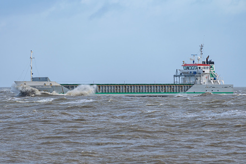 Cuxhaven, Germany - December 22, 2023: general cargo vessel Scheldebank on the river Elbe