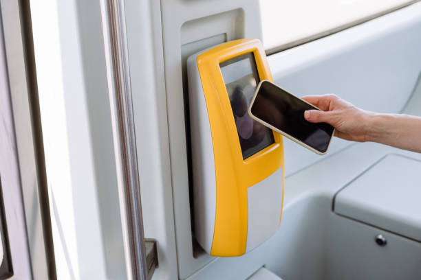 istock Buying digital ticket on public transport in terminal using application in mobile phone. 1914469402
