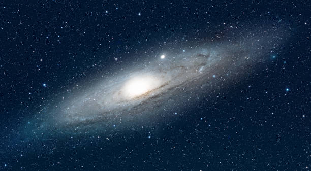 andromeda spiral galaxy on a starry night - ring galaxy imagens e fotografias de stock