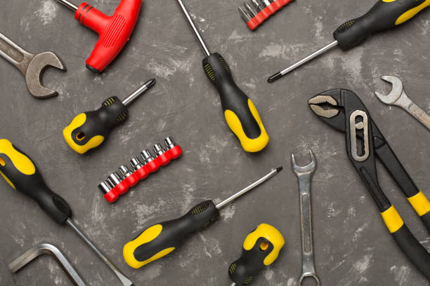 istock Set of tools on concrete background, top view 1914534863