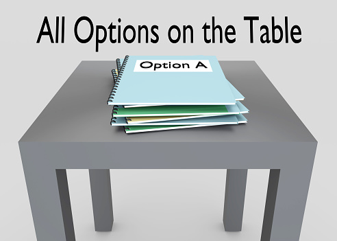3D illustration of a stack of booklets on a Table.