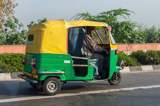 Three-wheeler tuktuk cars rickshaw drivers are facing a downturn in their business due to the down slide in the Indian economy in Mumbai