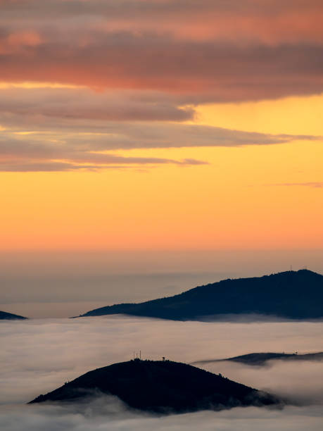 istock Mountains among a sea of clouds at dawn 1914567267