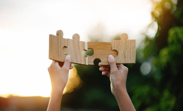istock Jigsaw Connectedness Collaboration Teamwork Important parts and communications success goals 1914574602
