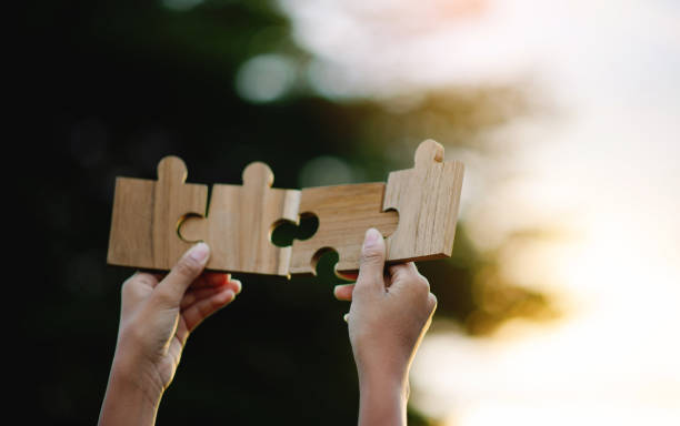 istock Jigsaw Connectedness Collaboration Teamwork Important parts and communications success goals 1914574605