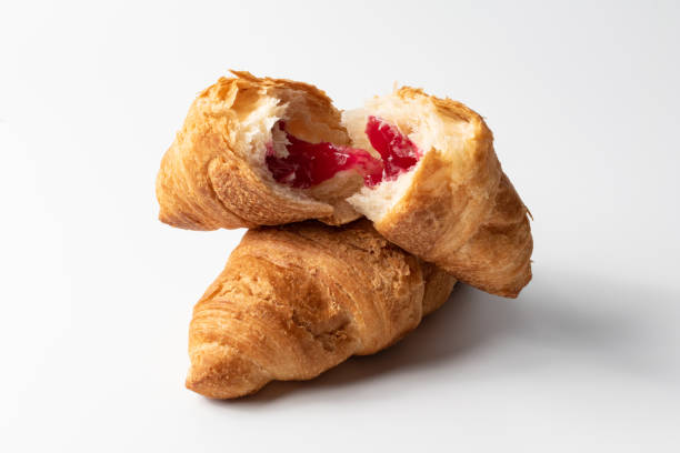 Croissant with stuffing on a white background stock photo