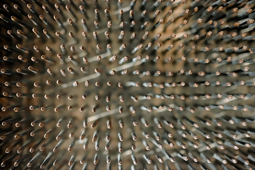 Bed of nails. Metal nails. Top view.