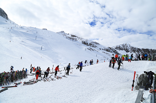 Hintertux - Austria. There is skiing on the Hintertux Glacier all year round, 365 days a year. The skiers enjoy the fantastic view and the beautiful weather with sunshine.