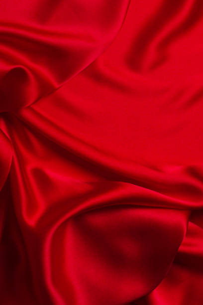 istock Red silk or satin luxury fabric texture can use as abstract background. 1914758338