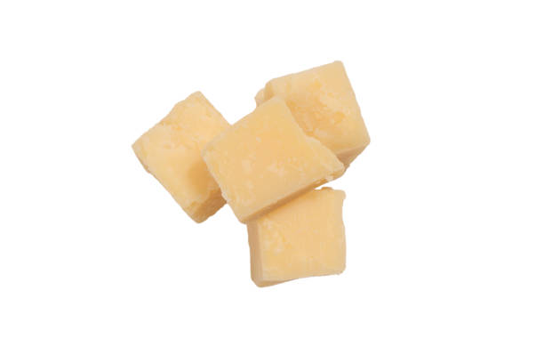 cheese cubes isolated on a white background. - chloroplasty zdjęcia i obrazy z banku zdjęć