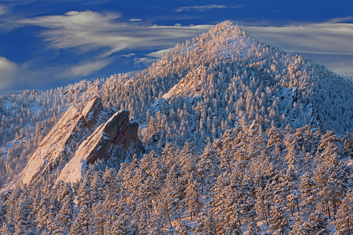 Winter landscape of the Flatirons on Bear Mountain at sunrise, Rocky Mountains, Boulder, Colorado, USA